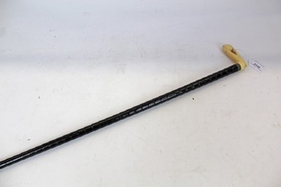 Lot 2132 - 19th century ebony walking cane with stepped decoration with silver plated mount and carved ivory handle depicting a beak holding a nut, 92cm in length