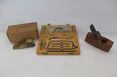 Lot 2149 - Lie-Nielsen brass plane, a wooden plane and multicraft tool set