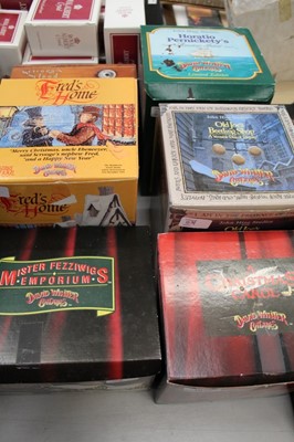 Lot 1039 - Six David Winter cottages - Old Joe's Beetling Shop, Mister Fizzwigs Emporium, A Christmas Carol, Fred's Home, Scooge's Home and Horatio Penickety's Amorous Intent, all boxed
