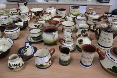 Lot 845 - Large collection of Torquay motto ware including teapots, vases, jugs, dishes etc