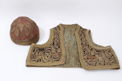 Lot 1830 - Uzbek Bullion work hat, together with a similar children's waistcoat (2)