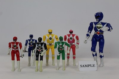 Lot 1535 - Power Rangers selection of figures in domed plastic truck