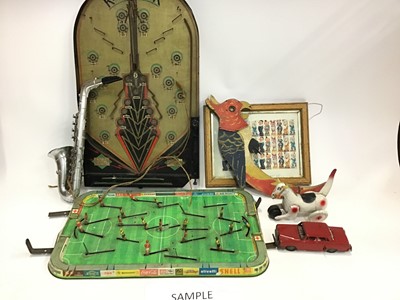 Lot 1582 - Bag and box of sundry toys including Tin Plate Football games