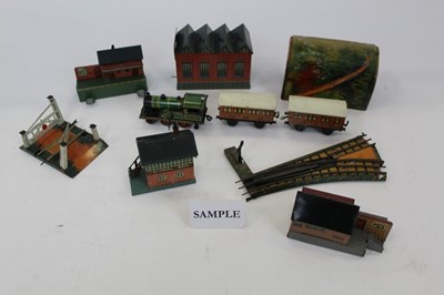 Lot 1531 - Selection of Meccano with instruction books and railway tinplate clockwork set with tinplate buildings