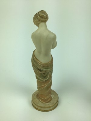 Lot 22 - Pair of Royal Worcester Blush ivory semi clad female figures