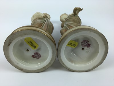Lot 22 - Pair of Royal Worcester Blush ivory semi clad female figures