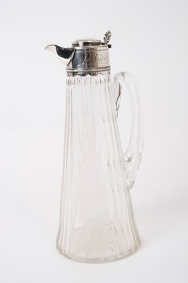 Lot 225 - Victorian cut glass claret jug of tapered form, with finely etched floral decoration of water lilies