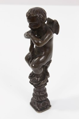 Lot 779 - 19th century bronze putti seal