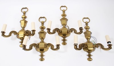 Lot 667 - Set of four bronze wall lights