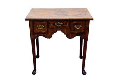 Lot 1284 - Early 18th century walnut feather banded lowboy, with quarter-veneered top, 74cm wide