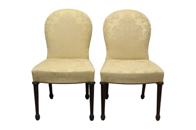 Lot 1287 - Pair of Mid-18th century style Continental mahogany upholstered side chairs, each with arched lemon silk damask upholstered back and fluted legs