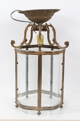 Lot 1323 - Continental brass hall lantern with six shaped glass panels