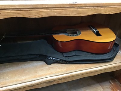 Lot 122 - A Maxine children's guitar in case
