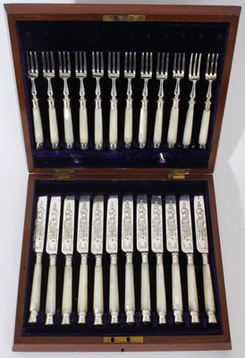 Lot 267 - Good quality set of twelve Victorian silver desert knives and forks with mother of pearl handles (Sheffield 1888)