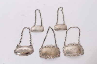 Lot 374 - A collection of five 18th century and later silver wine labels, various dates and makers