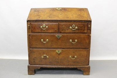 Lot 617 - Early 18th century walnut feather banded bureau, with two over two long drawers, 85cm wide