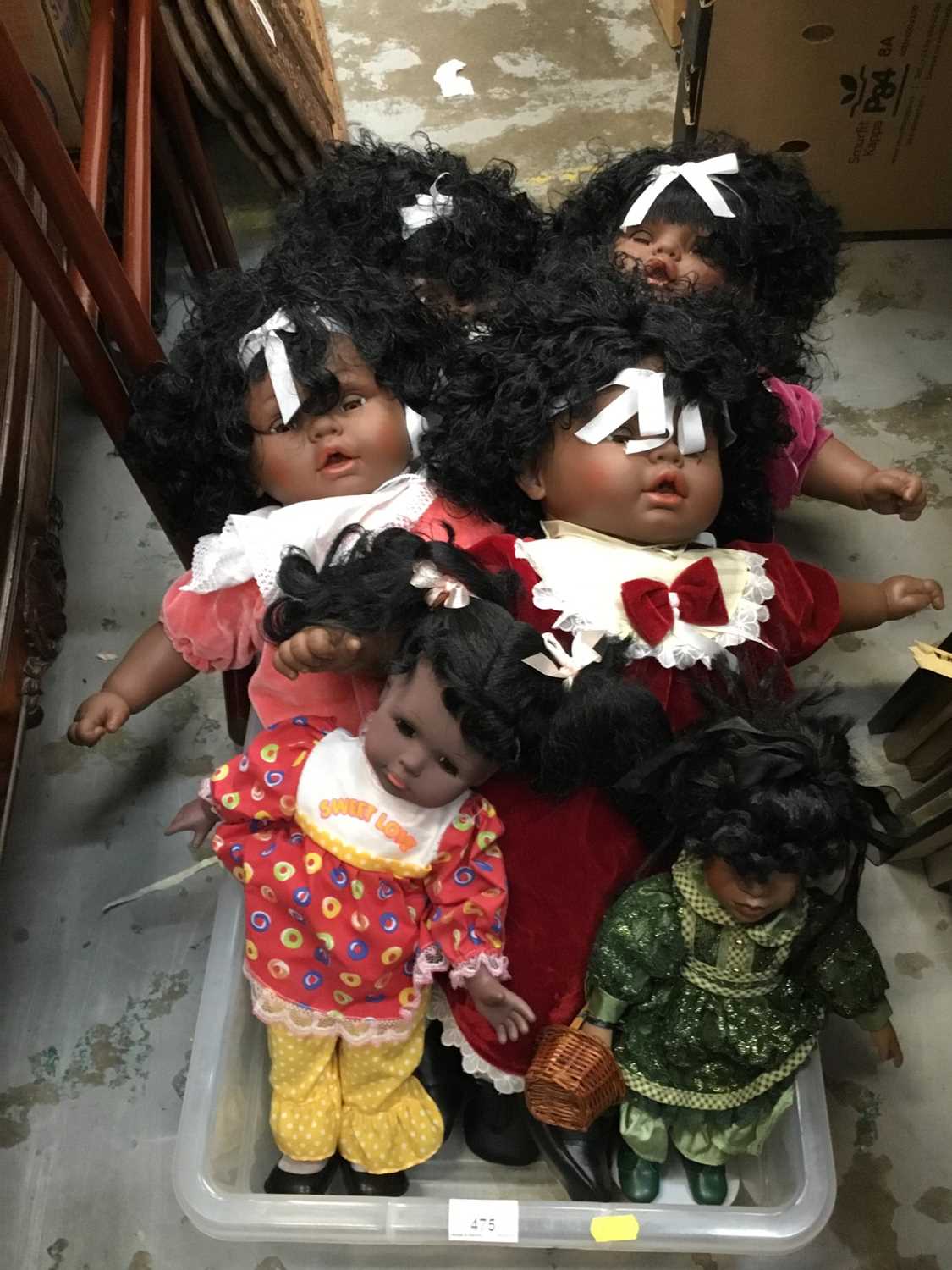 Lot 475 - Collection black dolls including one porcelain