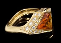 Lot 645 - A citrine, diamond and 18ct gold ring, by Pepi,...