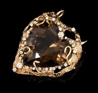 Lot 647 - Large smoky quartz and diamond 'heart' pendant,...