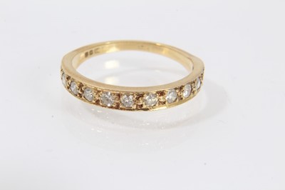 Lot 524 - 18ct diamond half hoop eternity ring