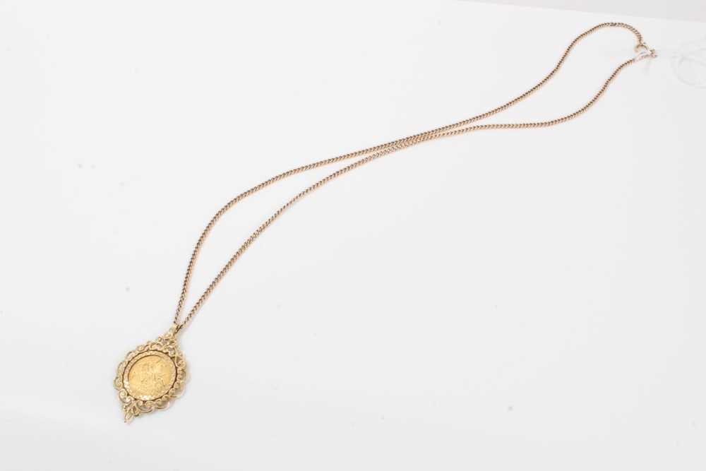 Lot 82 - Edwardian gold half sovereign in 9ct gold pendant mount on chain