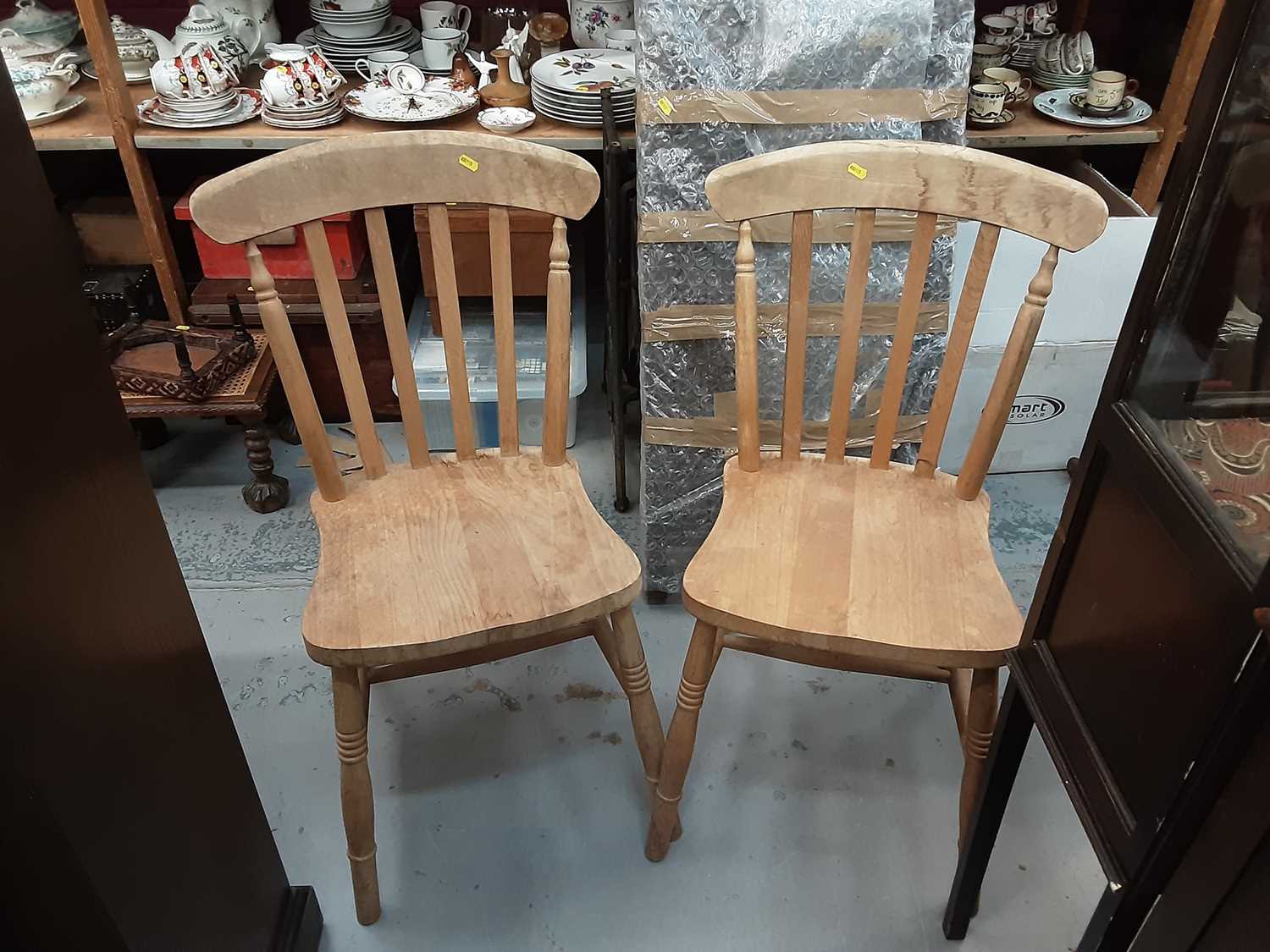 Lot 944 - Five pine stick back chairs