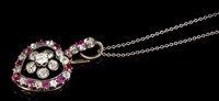 Lot 652 - Edwardian diamond and ruby heart-shape pendant,...