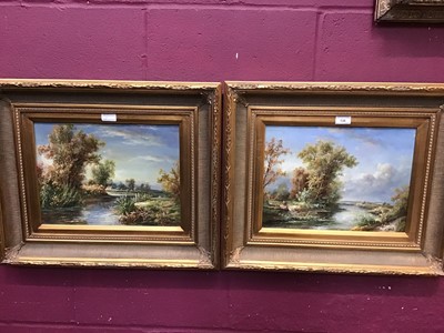 Lot 136 - Pair of oils on panel depicting a Dutch Summer river scene with figures in gilt frames, signed Lee Dale. 29cm x 39cm