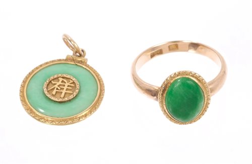 Lot 666 - Antique Chinese jade pendant with yellow metal...