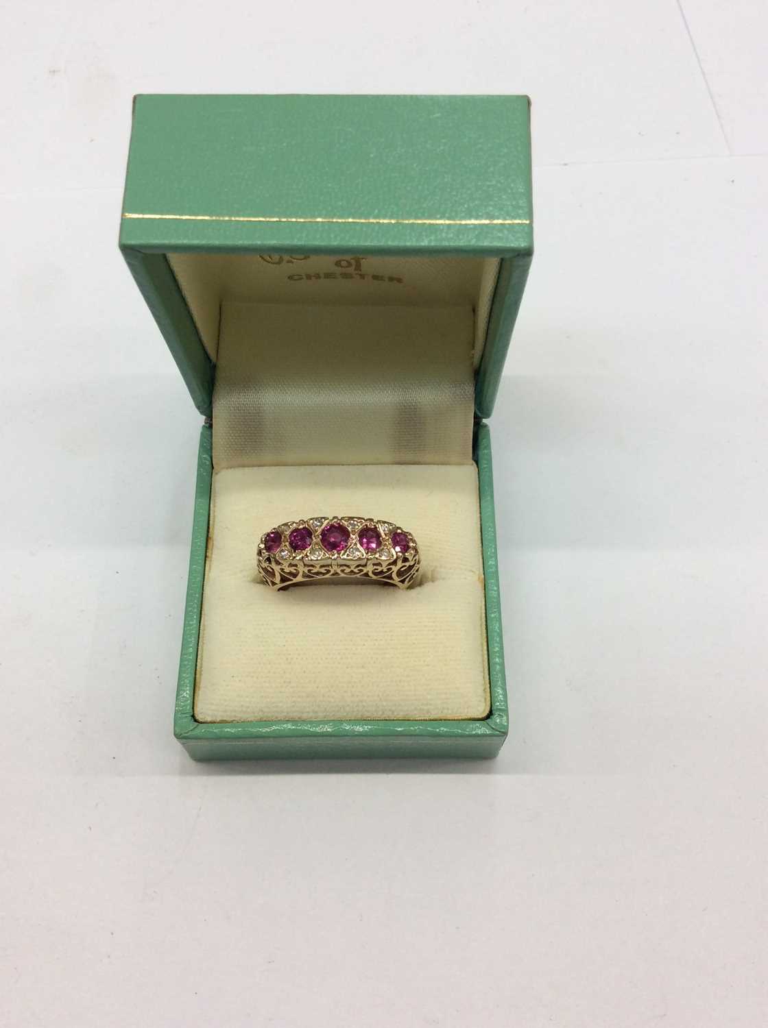 Lot 708 - 9ct gold five stone ruby and diamond ring