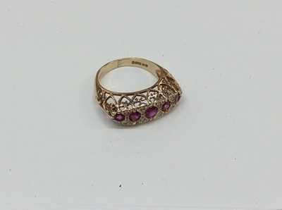 Lot 708 - 9ct gold five stone ruby and diamond ring