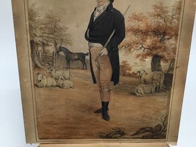 Lot 74 - Englsih School, circa 1810, watercolours, an elegant gentleman standing in a landscape, sheep and his bay hunter byond, unframed, 38cm x 26cm