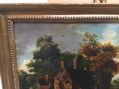 Lot 83 - Dutch School, 18th century, oil on oak panel, A wooded river landscape with figures fishing and shooting by a large house, period gilt frame, 30cm x 42cm