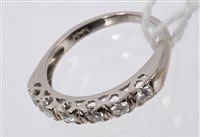 Lot 674 - Diamond eternity ring with a half hoop of six...