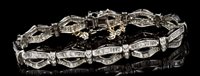 Lot 676 - Diamond bracelet with articulated panels of...