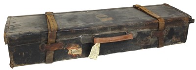 Lot 825 - Early 20th century H. Holland leather and oak double gun case, fitted for 28.5 inch barrels, paper label to inside of lid, 86cm x 24cm overall