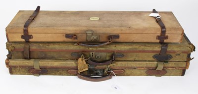 Lot 830 - Three early 20th century leather and canvas gun cases, one named to lid J. F. Todhunter, Royal Artillery, the others initialled P.A.L.S.