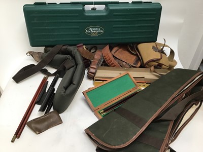 Lot 839 - Mixed lot of sporting accessories to include gun slings, cleaning kits, four cartridge belts, plastic gun travelling case etc