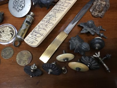 Lot 270 - Box of assorted items to include 19th century leather covered jewellery box, wooden snuff boxes, carved wooden seal, Regency and other teapot knops, miniature signed Essex cricket bat, copies of co...