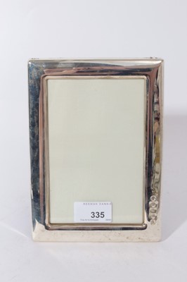 Lot 335 - Contemporary silver photograph frame of rectangular form, (Sheffield 2002), maker Carrs in original cardboard box, 18.5 x 13.5cm