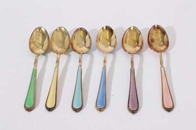 Lot 204 - Set of six George VI Silver gilt and guilloché enamel coffee spoons in fitted case, (Birmingham 1937), Maker William Suckling Ltd, each spoon 10.5cm in length