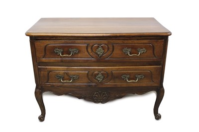 Lot 1200 - 18th century French walnut commode with two drawers with heart shape design