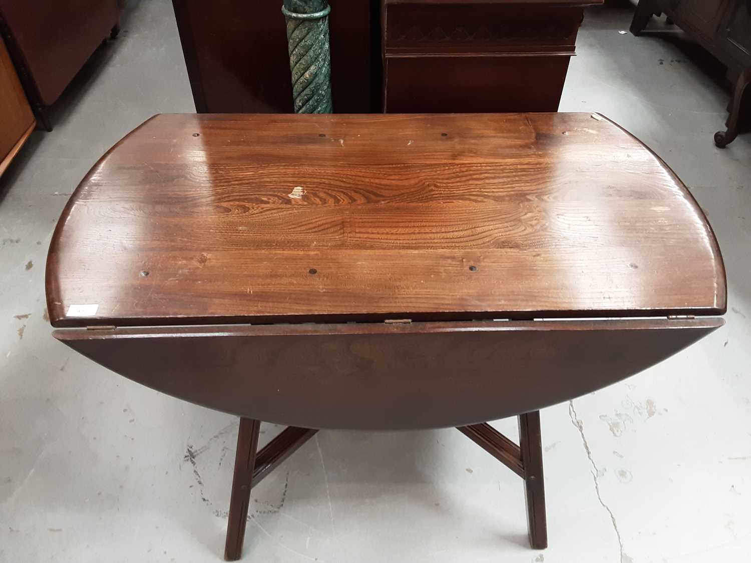 Lot 922 - Ercol drop leaf table and an Ercol elbow chair