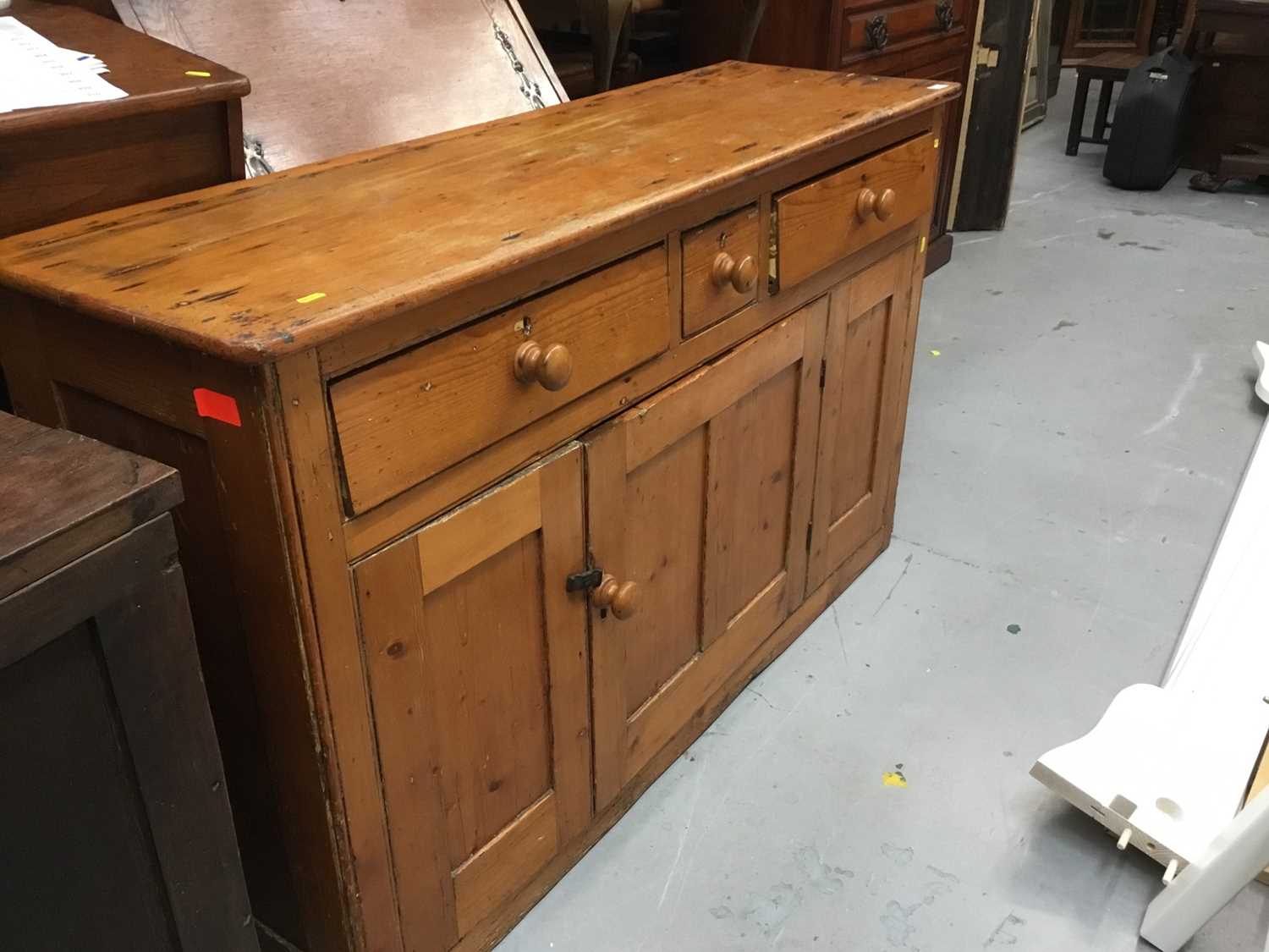Lot 900 Victorian pine dresser base with three