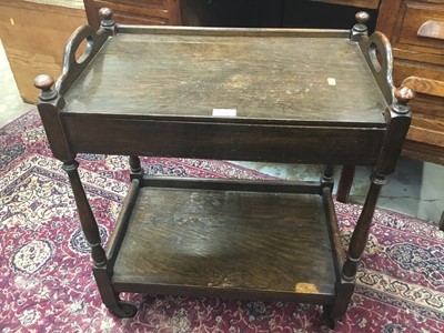 Lot 954 - 1920s oak tea trolley with tray top and baize-lined interior compartment- two tier