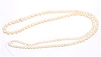 Lot 701 - Cultured pearl opera-length necklace with a...