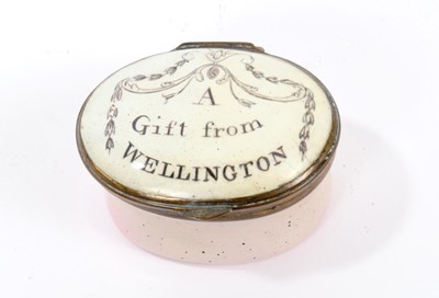 Lot 689 - A South Staffordshire enamel patch box 'A Gift from Wellington'