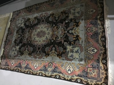 Lot 1135 - Good quality Persian part silk rug together with a Chinese wool pile washed ground rug