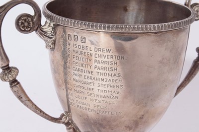 Lot 294 - George V Irish silver trophy cup of inverted bell form with twin scroll handles with engraved inscription 'St Margaret's Folkstone', raised on pedestal foot, (Dublin 1913