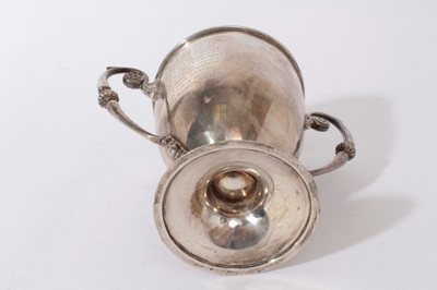 Lot 294 - George V Irish silver trophy cup of inverted bell form with twin scroll handles with engraved inscription 'St Margaret's Folkstone', raised on pedestal foot, (Dublin 1913